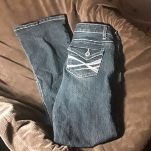 Stretchy, mid rise boot cut Jeans